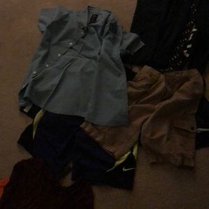 Nike shorts and button up shirt and trousers